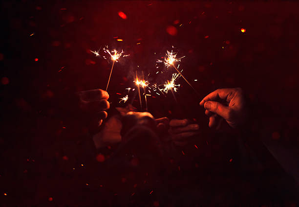 istock Celebrations with sparklers and fireworks, parties and mutual congratulations. 2234440982
