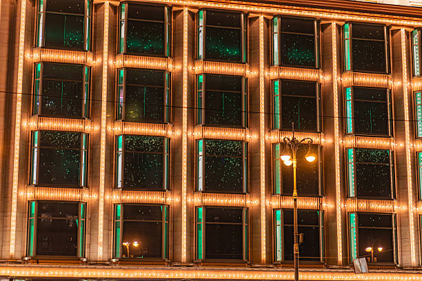 istock Summary Nighttime image of tall, lit building with festive decorative lighting a 2234445840