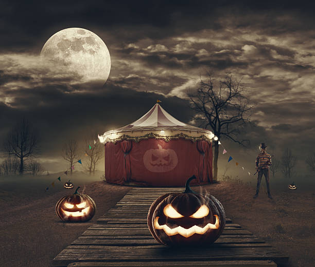 istock Scary circus tent and Halloween pumpkins 2234449854
