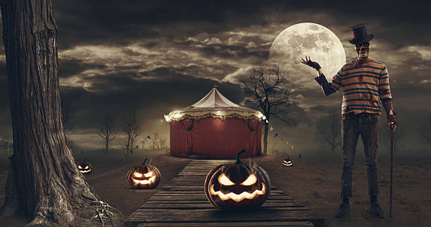 istock Creepy circus tent and scary character 2234450233