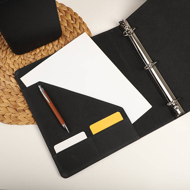 istock Open Black Folder with Blank Paper and Business Card Slots on Desk 2234457566