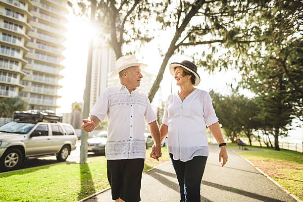 istock active seniors standing together at the park 2234463410