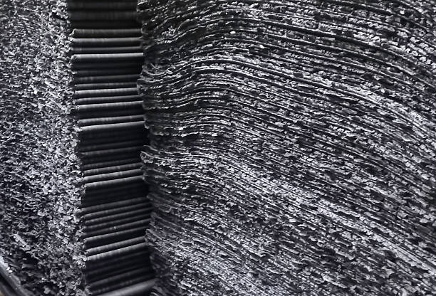 Rubber masterbatch plates from the batch off machinery are kept waiting for chemical adding.