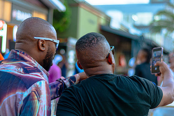 Lively atmosphere at the Old Biscuit Mill in Cape Town, South Africa, featuring visitors exploring stalls, local food, and artisan crafts. A vibrant scene of community, culture, and lifestyle.