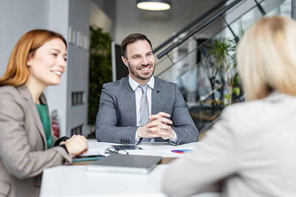 istock Business team discussing strategy during meeting in modern office 2234464514