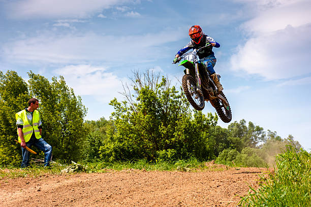 uzhhorod, ukraine - may 21, 2017: motorbike extreme jump. extreme enduro motocross in action. country cross ktm sports