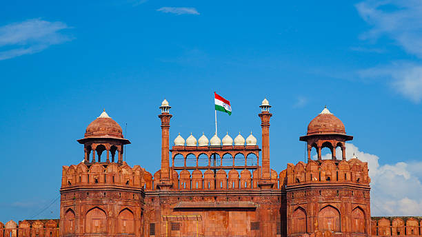 istock Red Fort Monument in Delhi with Indian Flag on Top 2234471192