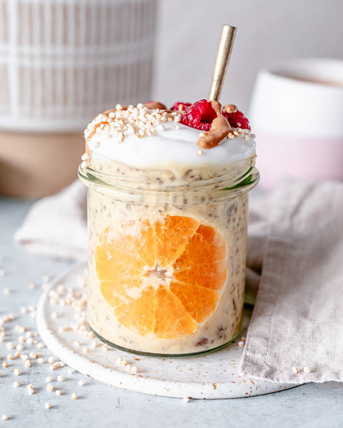 A jar of orange and cream flavoured overnight oats