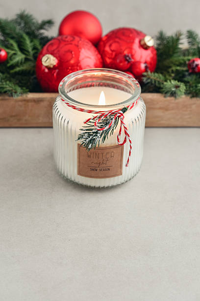 istock Candle in jar with christmas decorations 2234474734