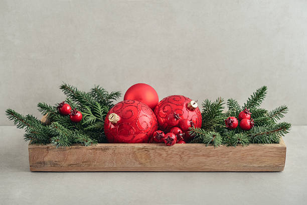 Christmas Ornaments on Red Background with Christmas Lights. Digitally generated image. 3d render.