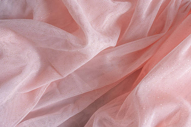 istock Elegant pale pink satin fabric closeup background. 2234475586