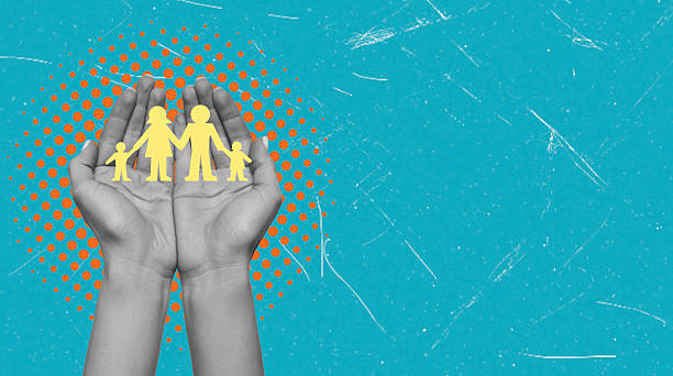 istock Art collage, Hands forming a protective shape around an illustration of a family, emphasizing support and unity in a bright setting. 2234478163
