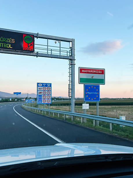 istock Highway View Approaching the Hungary Border with Direction and Warning Signs 2234481935