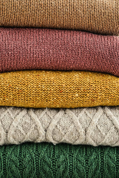 istock Pile of hand knitted winter clothes 2234483906