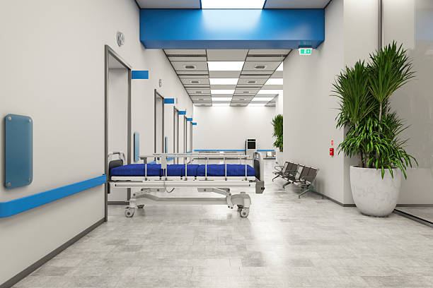istock Hospital Corridor with Empty Patient Bed and Clean Design 2234486611