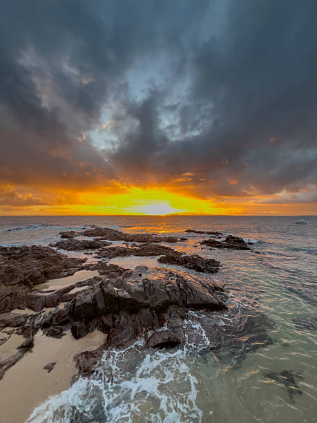 istock Rocky Coastline at Sunset with Dramatic Sky and Golden Ocean Light 2234486638