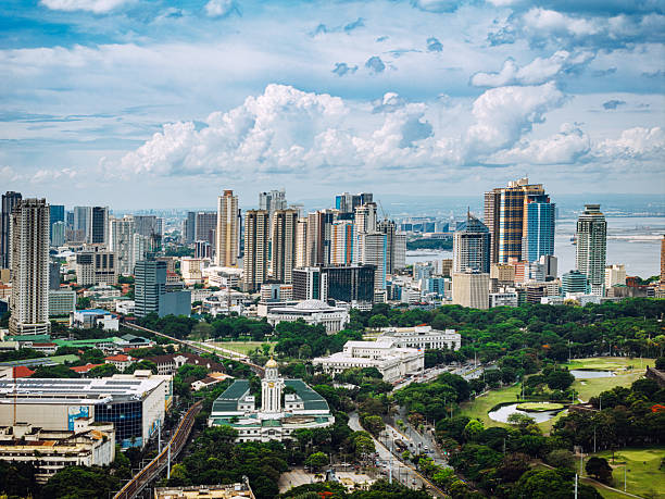 istock Panoramic View of Manila Skyline With Lush Greenery and Urban Architecture 2234488646