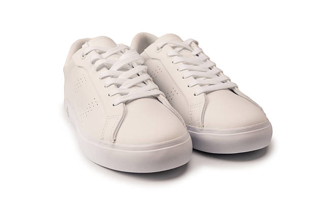 istock White leather sneakers isolated on white background. 2234488917