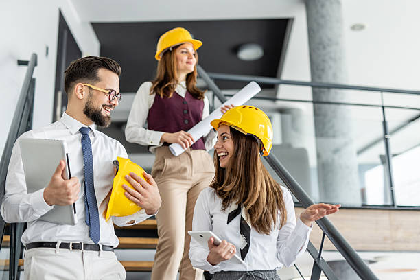 istock Architects walking down the stairs and discussing a project 2234491278