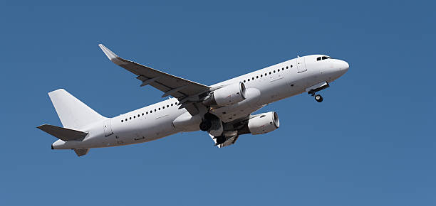 istock Airplane take off on the blue sky, Aircraft flying on sky background 2234493658