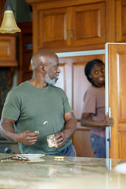 istock Senior Couple Enjoying Quality Time Together in the Kitchen 2234494874