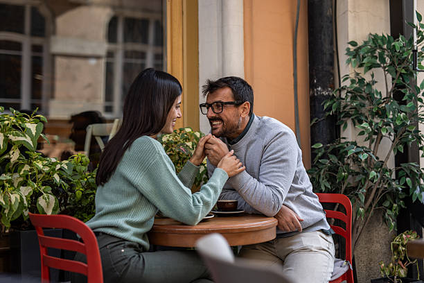 istock Romantic couple enjoying coffee date outdoors 2234496021