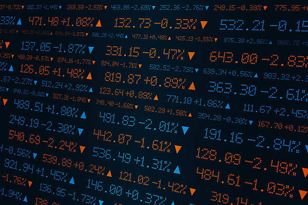 Digital stock ticker board with numbers and percentage changes in blue and orange, symbolizing finance, trading, and global market activity.