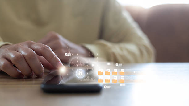istock Close-up of a hand using a smartphone with a hologram interface of cloud storage, file management, data protection, and cybersecurity technology for secure digital business and online communication. 2234498646