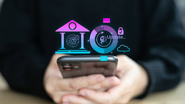 istock A man using a smartphone with a digital hologram showing banking system update, cybersecurity, cloud finance, mobile payment, and fintech innovation. Concept of secure online banking technology. 2234498648