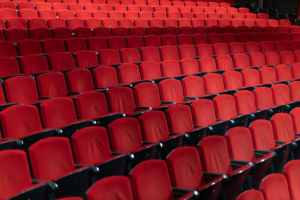 istock Rows of empty red seats in a theater ready for an upcoming performance 2234498671
