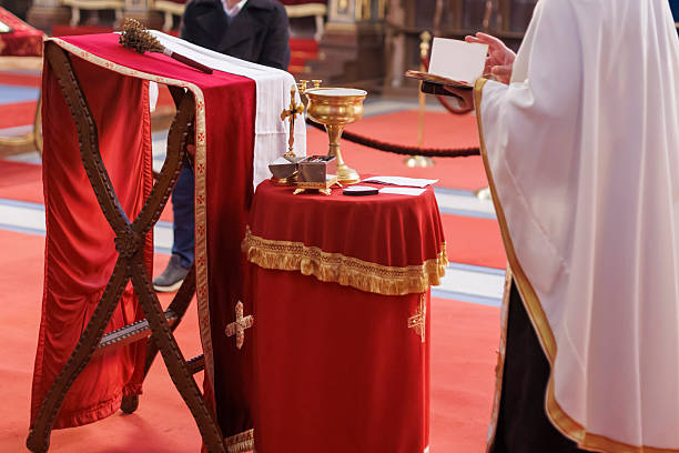 ceremony being performed in Orthodox church by a priest