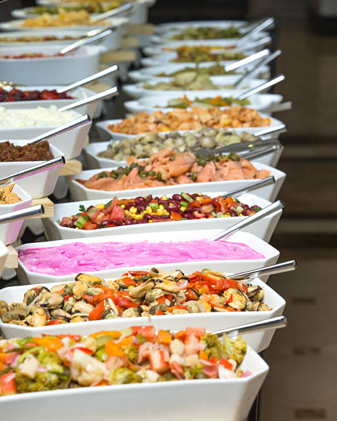 istock tray of assorted food for salad buffet 2234499248