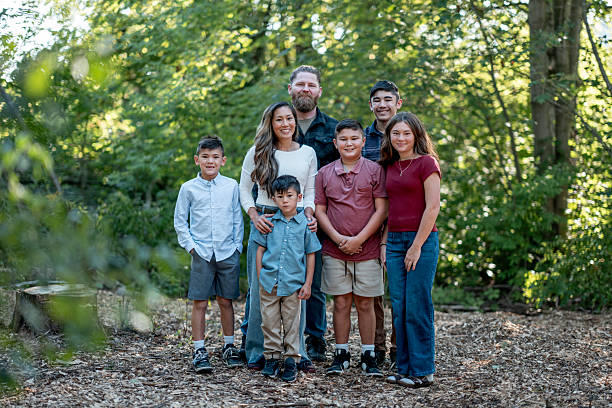 istock Happy Multiethnic Family Posing Outdoors in a Scenic Natural Setting 2234502885
