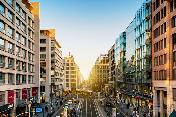 istock yellow streetcar on Berlin Friedrichstrasse at sunset hour 2234504656