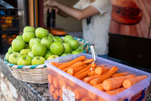 Carrots and green apples ready for Making squeezed juice at a street stall