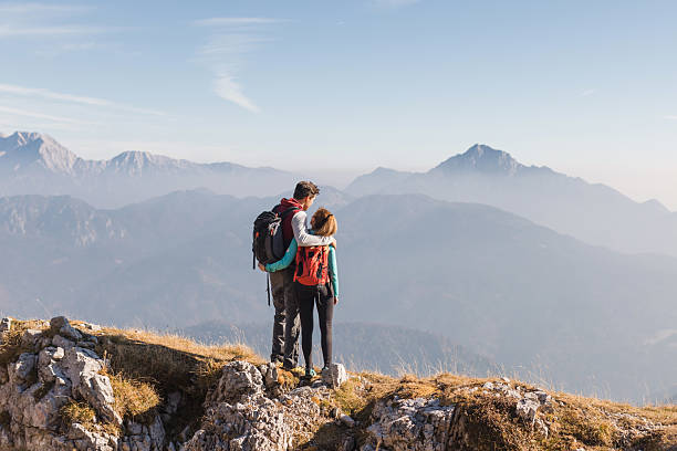 istock Couple enjoying a mountain view together 2234506497