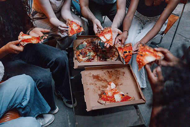 istock Friends connecting over delicious food in a stylish rustic courtyard setting 2234507277