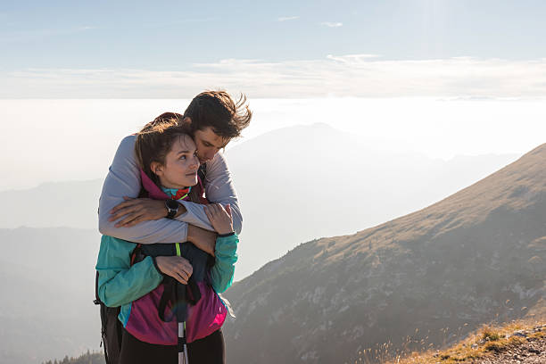 istock Couple takes in mountain views 2234507403