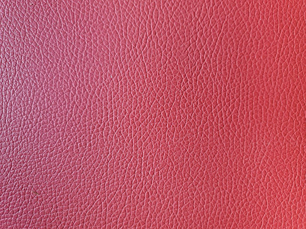 istock red and pink leatherette faux leather texture background 2234510939