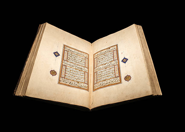 istock Ancient Quran manuscript with ornamental calligraphy 2234512800