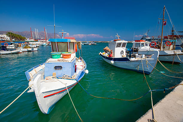Tinos, GR - 6 August 2023: Fishing boat in Panormos harbour