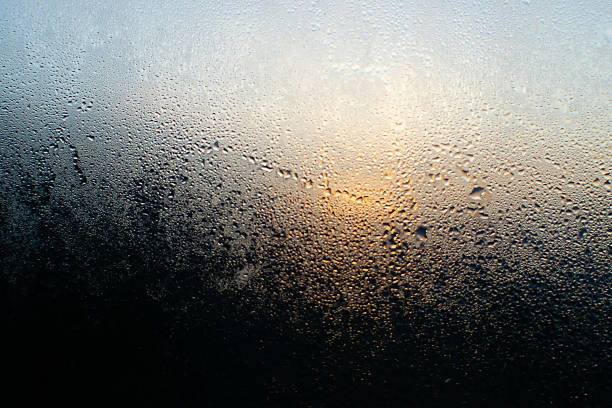 istock Sunrise shot behind glass filled with dew drops, abstract image, Kanchenjunga mountain range in the morning, Ravangla, Sikkim. Scenic view of great Himalaya, India, 2234513090