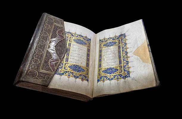 istock Ottoman Quran manuscript with gold and blue illuminated calligraphy 2234513462