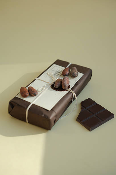 istock Chocolate parcel, gift chocolate bars in sustainable packaging. Cocoa beans. 2234518898
