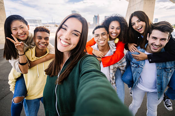 istock Multiracial group of young people taking selfie 2234522926