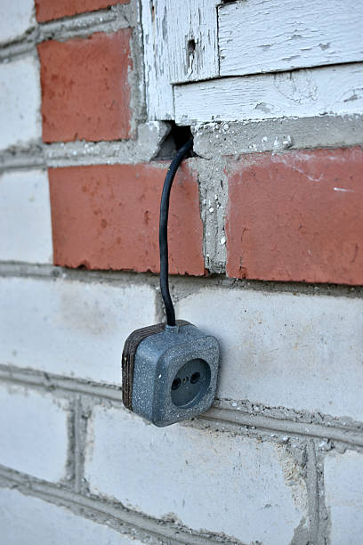 istock An electrical extension cord with sockets. An electrical outlet in the house. 2234523600