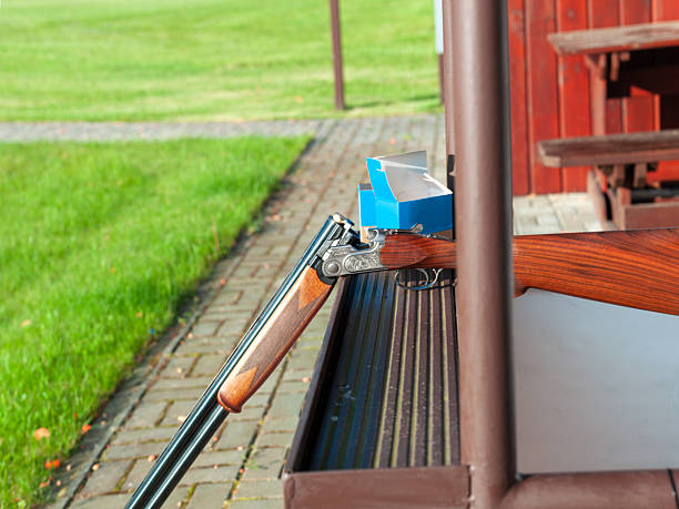 Professional trap shooter shooting clay targets.