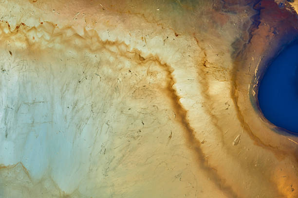Agate macro detail. close-up of a textured semi-precious gemstone background. backlight transparency