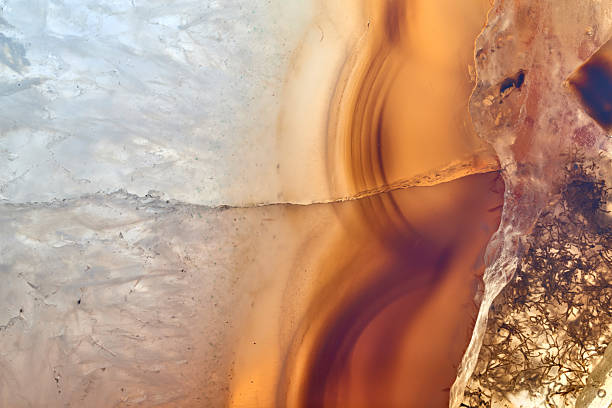 istock Agate macro detail. close-up of a textured semi-precious gemstone background. backlight transparency 2234524514