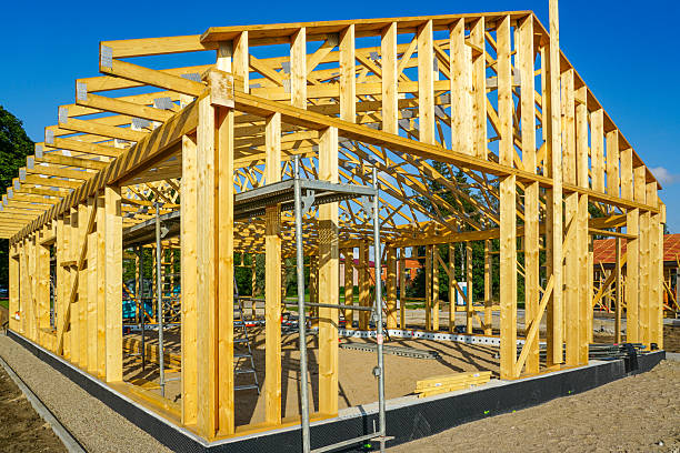 istock Wooden frame house construction with ICF foundation system under clear blue summer sky 2234528757